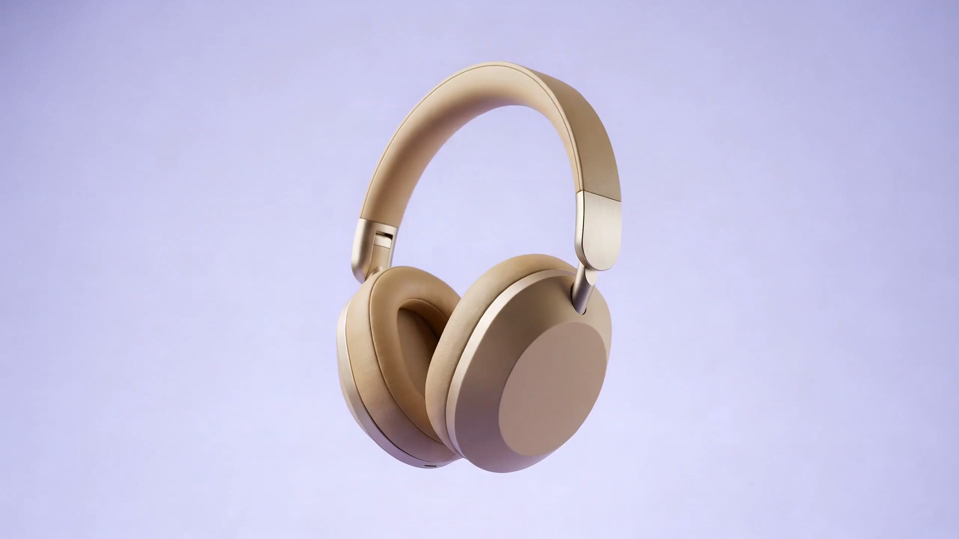 Aubrel One headphones in warm sand, turning slowly on a soft lavender stage